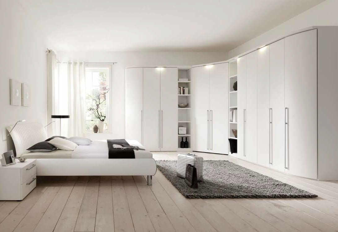 Armadio ad angolo / moderno / in legno / con ante battenti ...