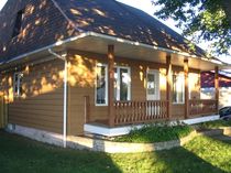 rivestimento di facciata in composito aspetto legno NOVIPLANK� S8 NOVIK