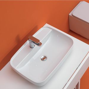 lavabo da appoggio / ovale / in ceramica / moderno