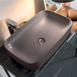 lavabo da terra / ovale / in ceramica / moderno