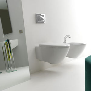 WC sospeso / in ceramica / con sciacquone ad incastro