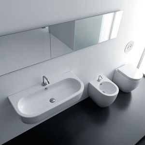 lavabo sospeso / ovale / in ceramica / moderno