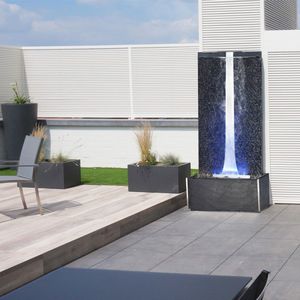 fontana da giardino / in pietra / in acciaio inox / moderna
