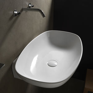 lavabo sospeso / ovale / in ceramica / moderno