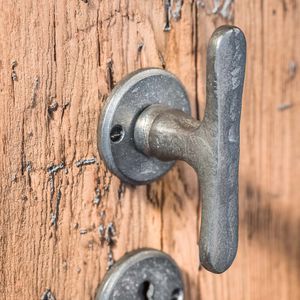 pomello per porta classico / in bronzo / in ferro