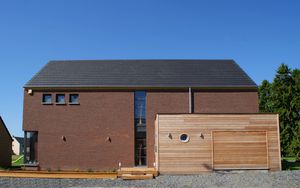 casa prefabbricata / in legno massiccio assemblato / moderna / con struttura in legno