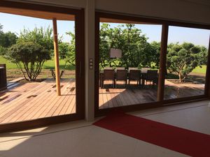 edificio prefabbricato / in legno massiccio / per uso residenziale / moderno