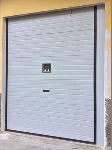 porta da garage sezionale / metallo / in schiuma di poliuretano / automatica