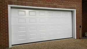 porta da garage sezionale / metallo / in schiuma di poliuretano / automatica