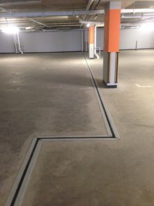 giunto di dilatazione in alluminio / in acciaio inossidabile / per parcheggio / carrabile
