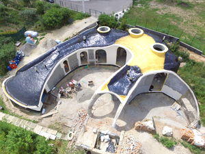 casa individuale / design originale / in calcestruzzo / ecologica
