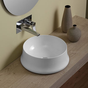 lavabo da appoggio / rotondo / in ceramica / moderno