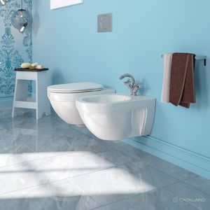 WC sospeso / in ceramica / con sciacquone ad incastro