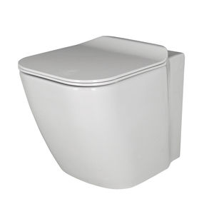 WC da appoggio / in ceramica / con sciacquone ad incastro