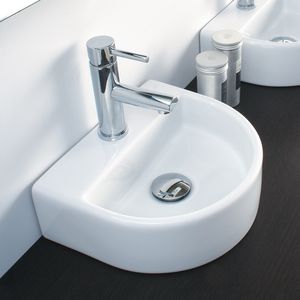 lavandino da appoggio / semitondo / in ceramica