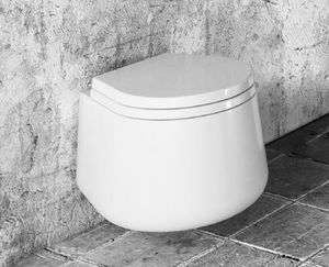WC sospeso / in ceramica / con sciacquone ad incastro