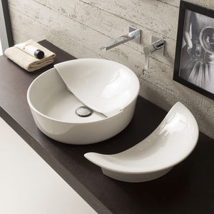 lavabo da appoggio / rotondo / in ceramica / moderno