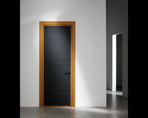 porta da interni / a ventola / in legno / filomuro