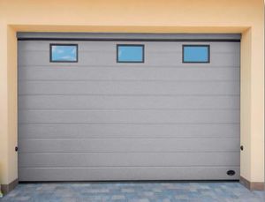 porta da garage sezionale / in acciaio / automatica