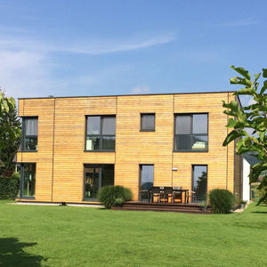 casa individuale / moderna / con struttura in legno / con terrazza