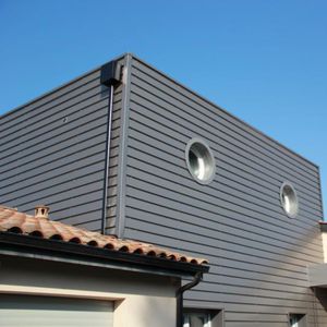 rivestimento di facciata in acciaio / in lamiera grecata / a doghe