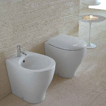 WC da appoggio / in ceramica / con sciacquone...