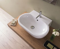 Lavabo da appoggio / in ceramica / ovale...