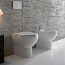 WC da appoggio / in ceramica / con sciacquone...