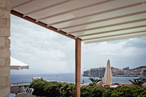 Pergola addossata / in alluminio / con copertura...