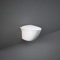 WC sospeso / in ceramica / senza brida