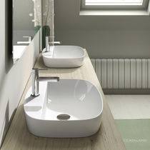 Lavabo da semincasso / in ceramica / ovale...