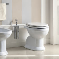 WC da appoggio / in ceramica / con sciacquone...