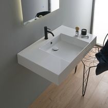 Lavabo sospeso / in ceramica / con piano...