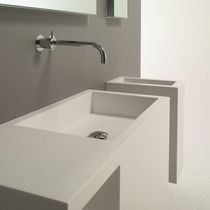 Lavabo sospeso / in Corian® / con piano...