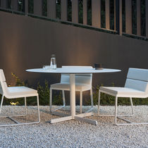 Tavolo moderno / in iroko / con supporto...