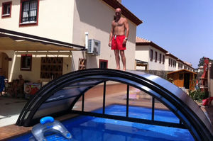 copertura per piscina bassa / telescopica / in metallo / ad azionamento manuale