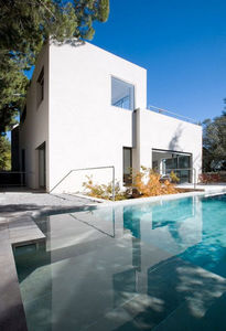 casa tipo / moderna / in calcestruzzo / a due piani