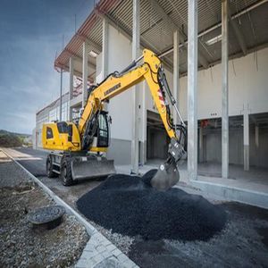 escavatore su ruote