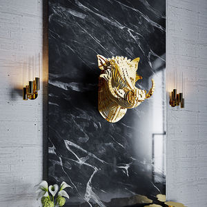 scultura in ottone