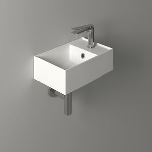 lavandino sospeso / da appoggio / rettangolare / in ceramica