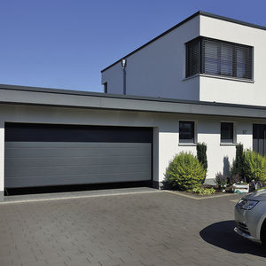 porte sezionali per garage / in schiuma di poliuretano / automatiche / isolanti