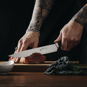 coltello tranchelard con manico in plastica