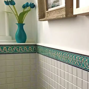 fregio in ceramica smaltata