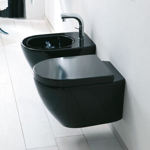 WC sospeso / da appoggio / in ceramica / con sciacquone ad incastro