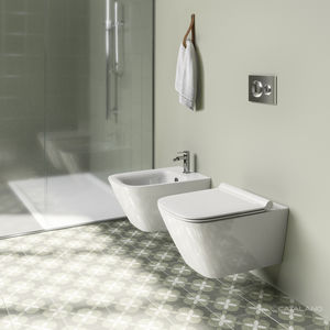 WC sospeso / in ceramica / senza brida