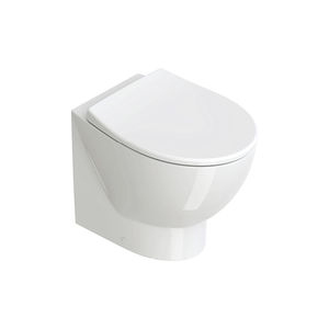 WC filomuro / in ceramica / senza brida
