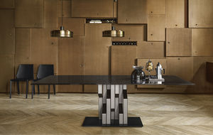tavolo design originale / in vetro / con supporto in metallo verniciato / rettangolare