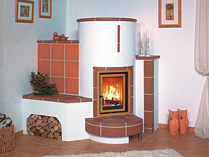 stufa a legna / ad angolo / in ceramica / tradizionale