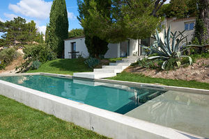piscina seminterrata / in calcestruzzo / su misura / corridoio di nuoto