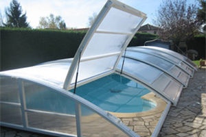 copertura per piscina bassa / telescopica / in alluminio / ad azionamento manuale